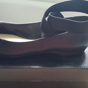 Crisscross soft black leather shoe